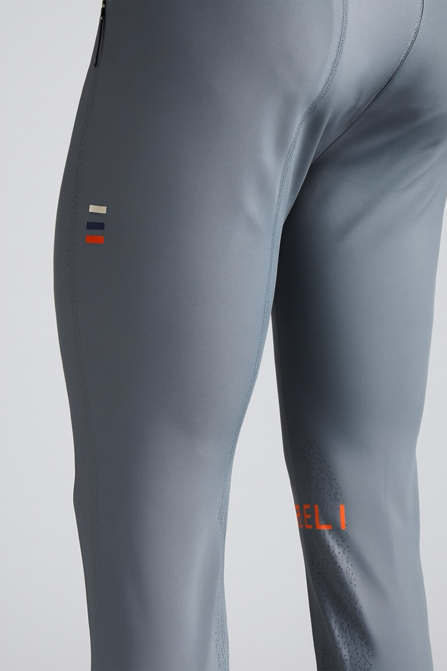 Gray breeches with a brand logo on a light gray background