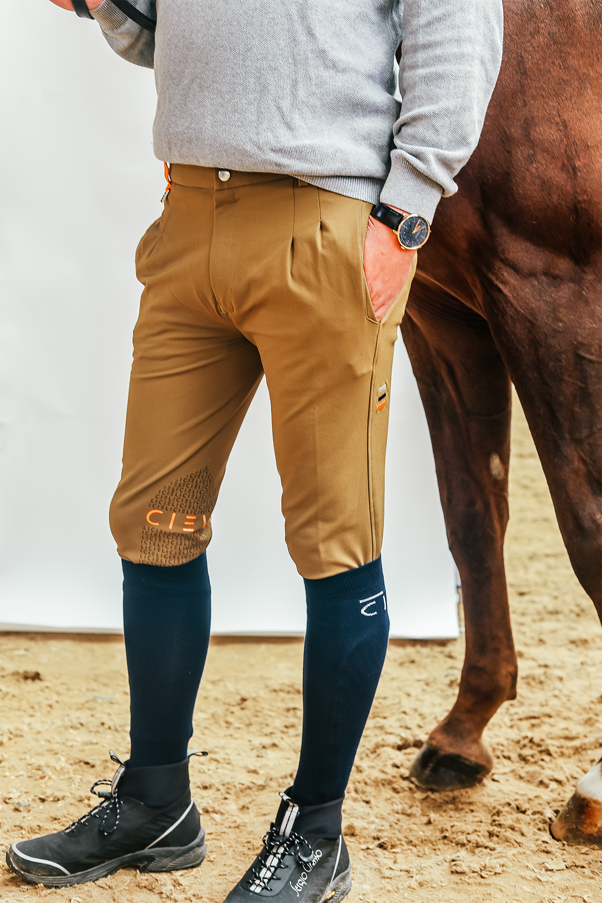 Man wearing khaki mens cieli equestrian riding breeches.