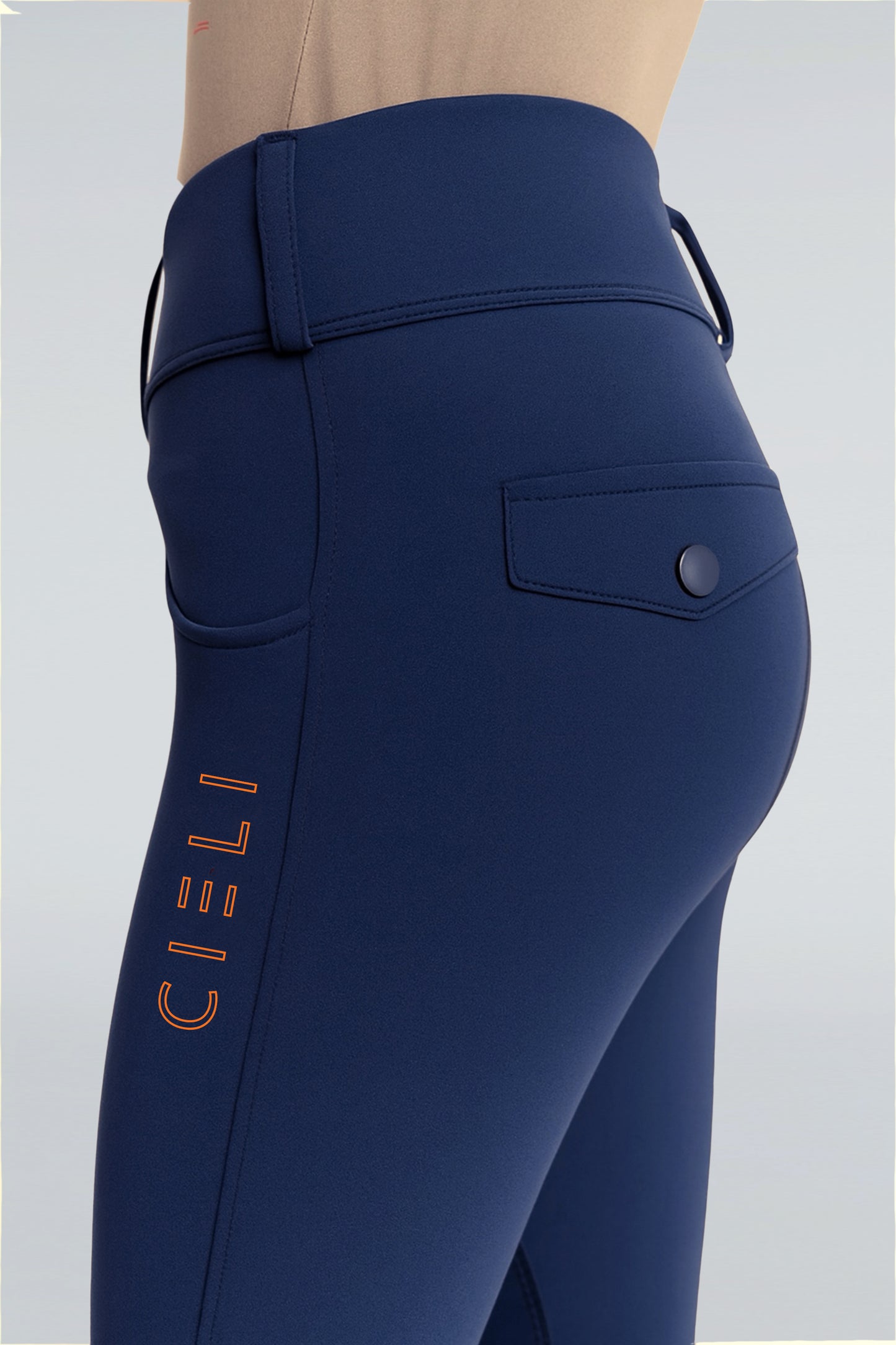 Navy blue leggings with a visible brand logo on a light gray background