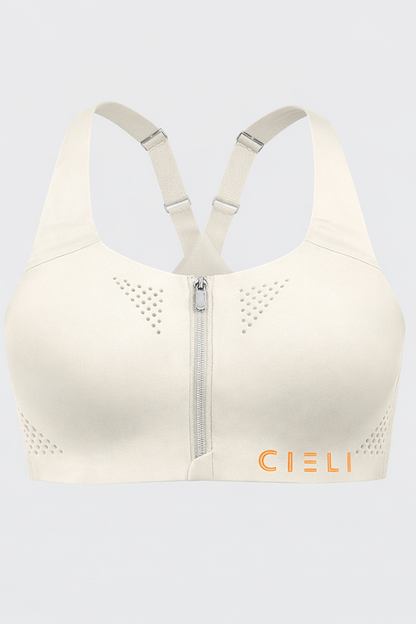 White sports bra with a zipper on a light gray background, featuring the brand 'CIELI'.