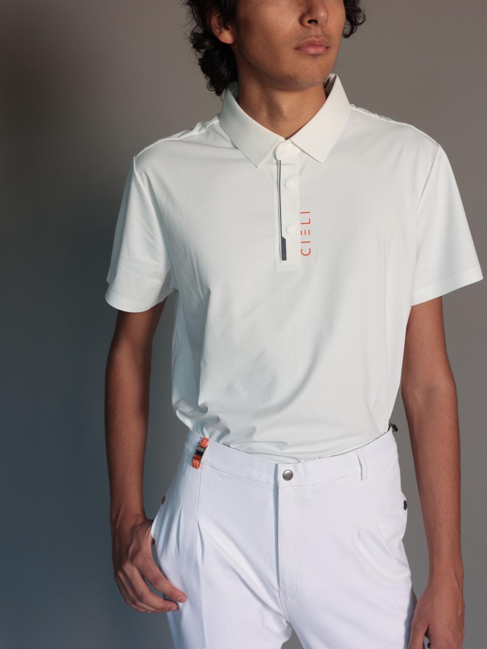 Person wearing a white polo shirt with a brand logo on a gray background