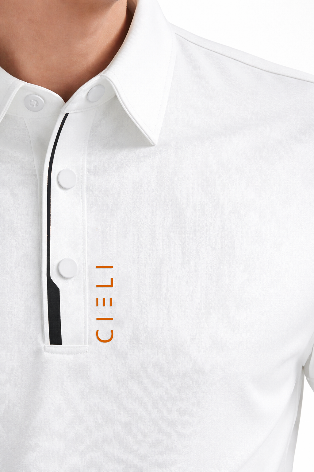Close-up of a white polo shirt with 'CIELI' branding on a blurred background