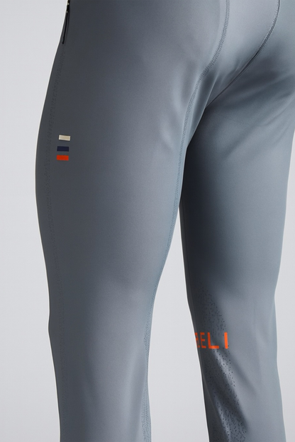Gray breeches with a brand logo on a light gray background