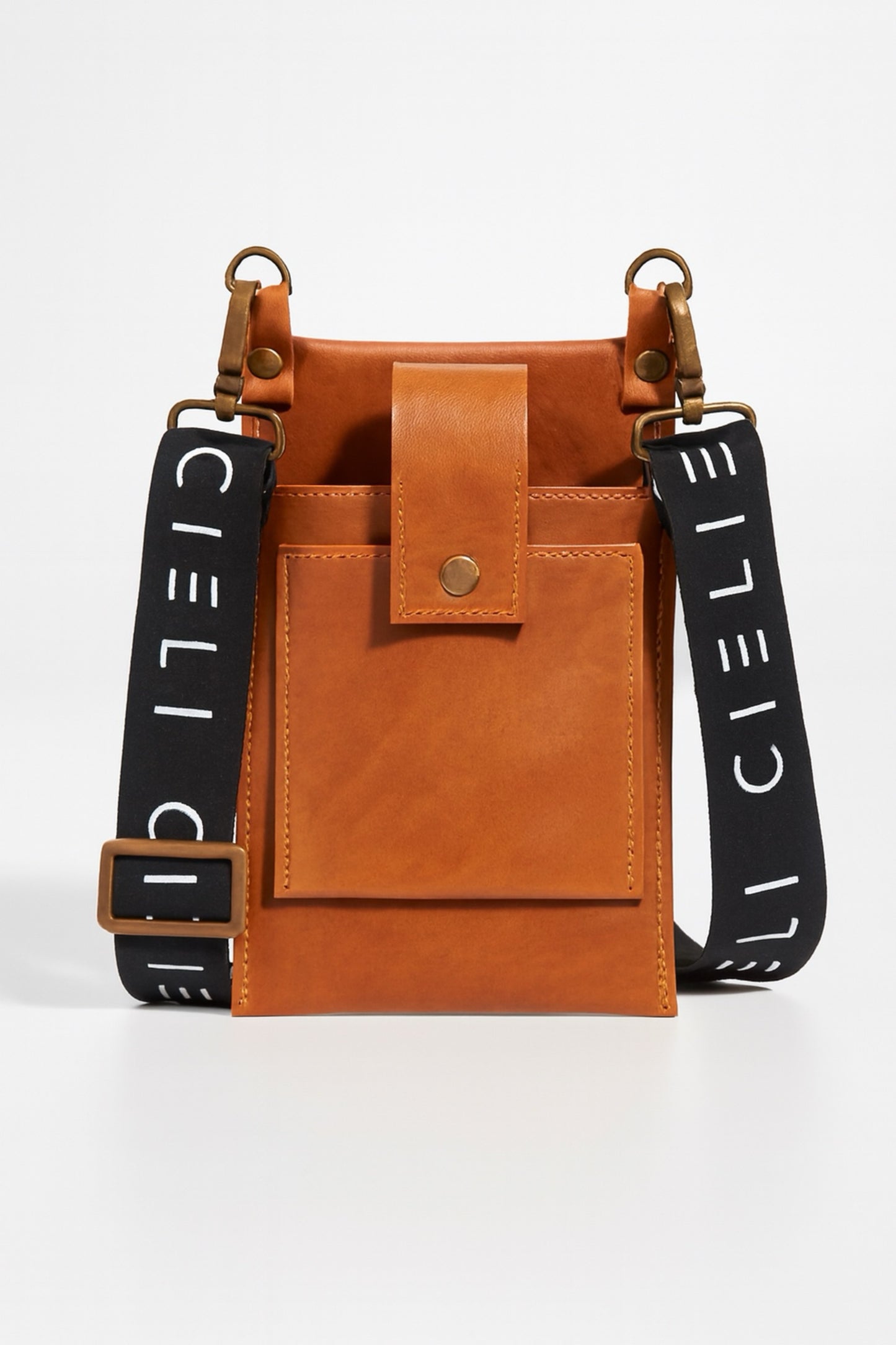 Brown leather bag with black straps featuring 'Cieli' branding on a white background